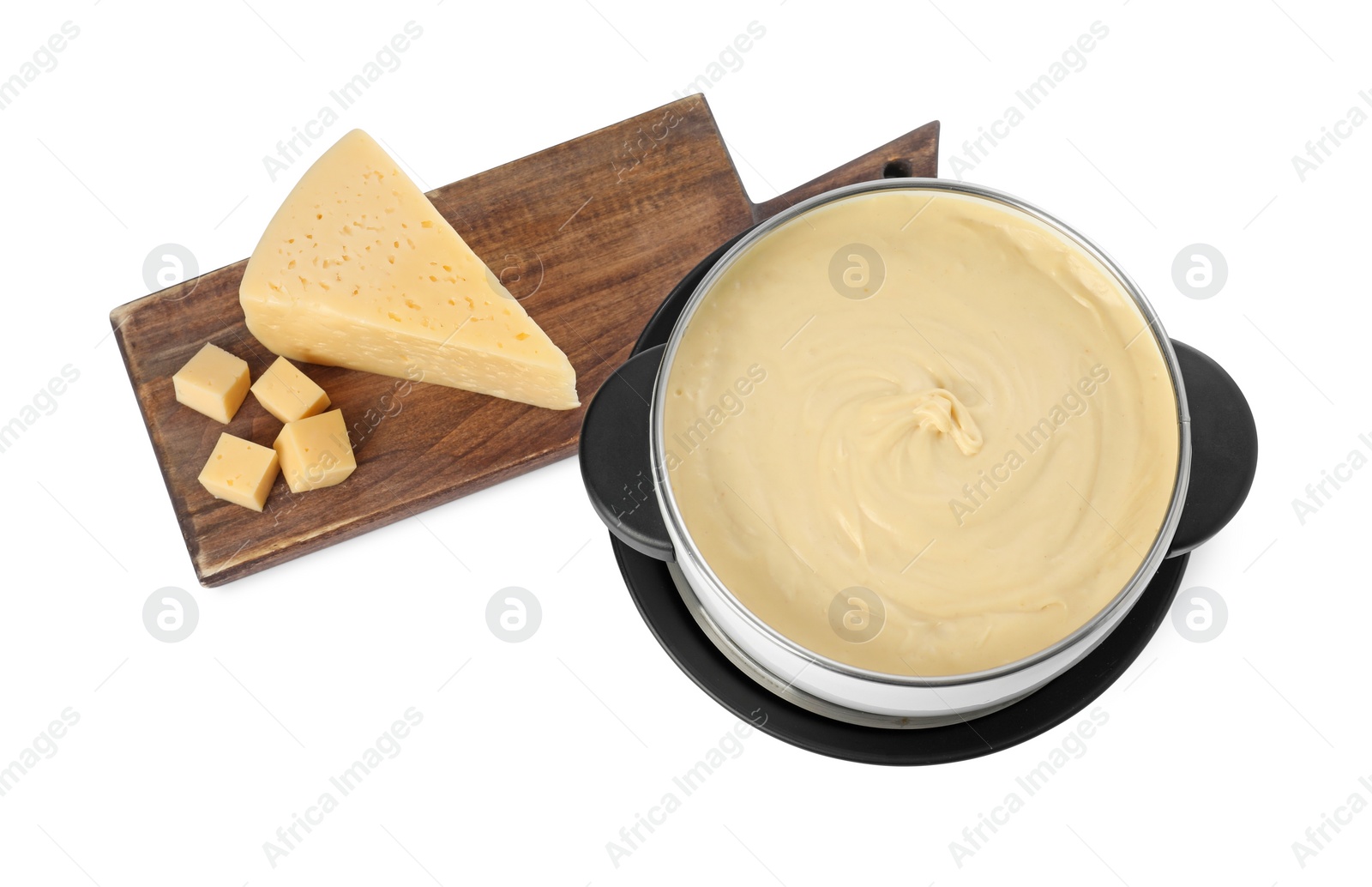 Photo of Fondue with tasty melted cheese and pieces isolated on white, top view