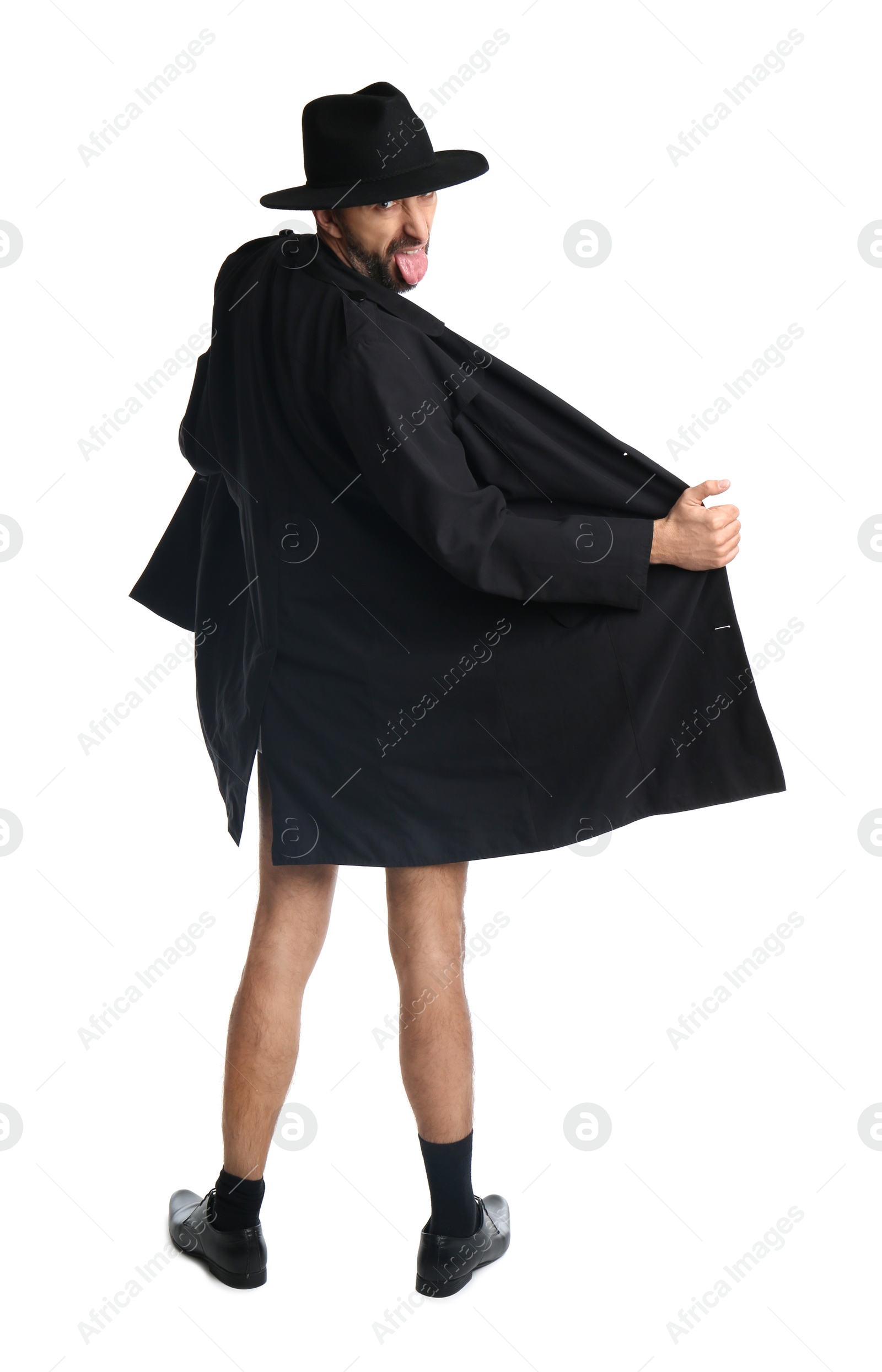 Photo of Exhibitionist exposing naked body under coat isolated on white, back view