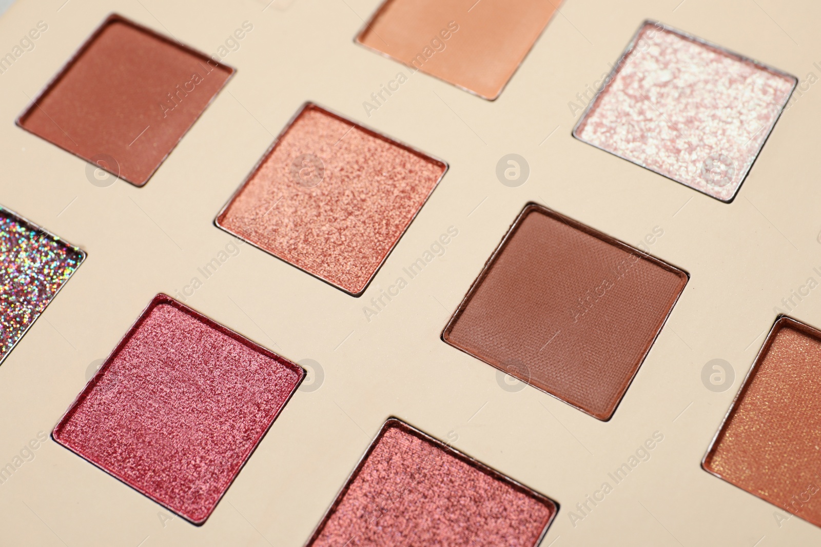 Photo of Beautiful eye shadow palette as background, closeup