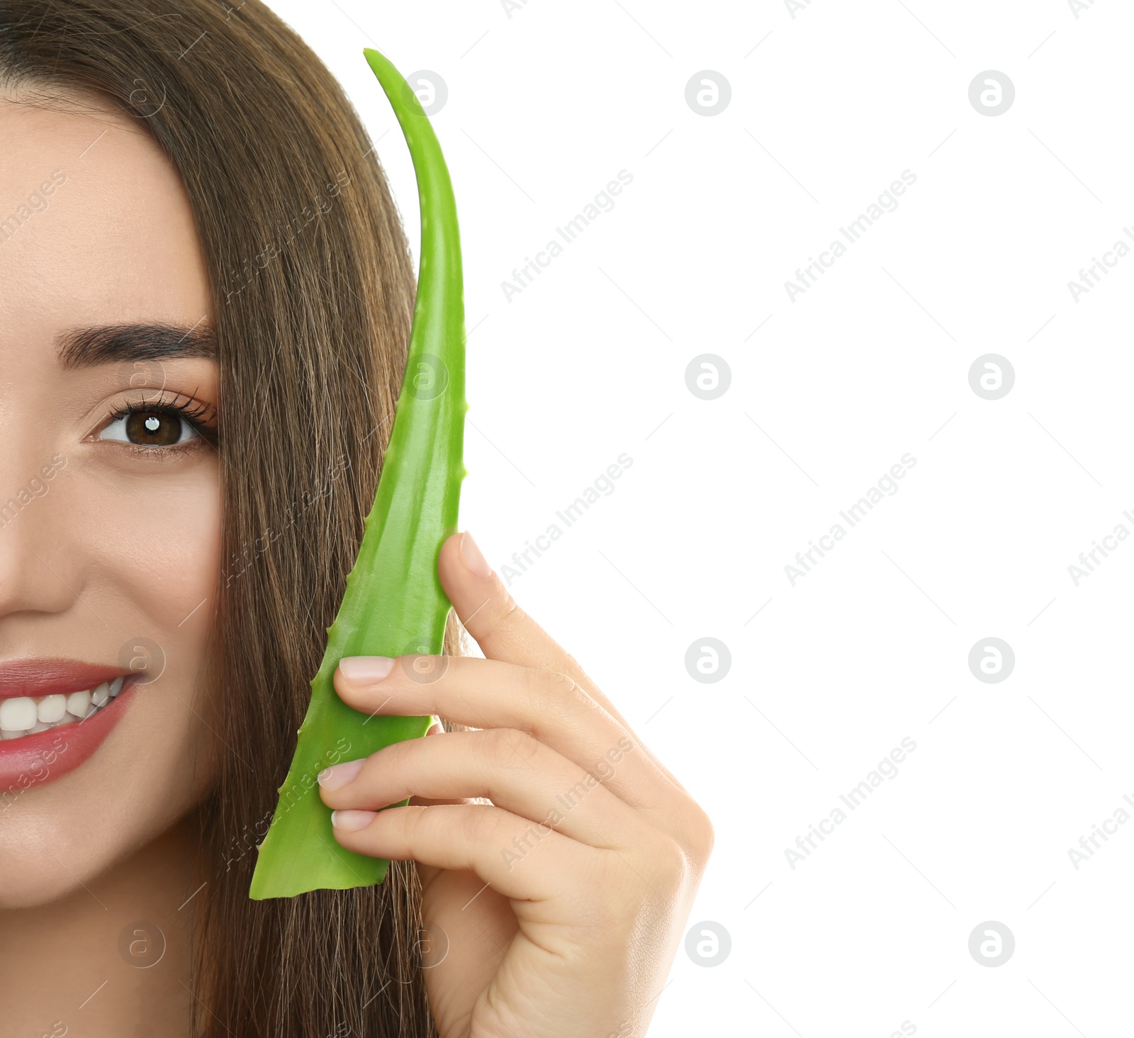 Photo of Young woman with aloe vera leaf on white background, closeup