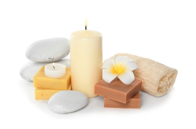 Photo of Beautiful spa composition with candles and soap on white background