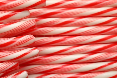 Many candy canes as background. Festive treat