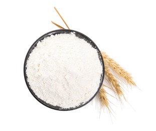 Photo of Bowl with wheat flour and spikes on white background, top view