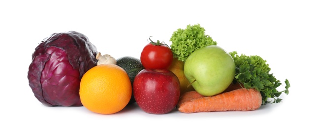 Pile of fresh fruits and vegetables isolated on white