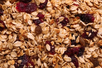 Photo of Sweet tasty granola as background, top view
