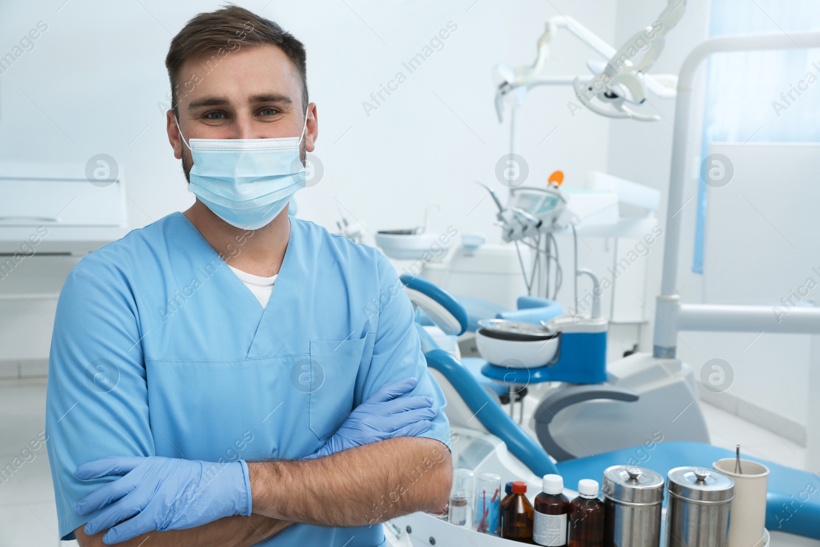 Photo of Portrait of professional dentist at workplace in clinic