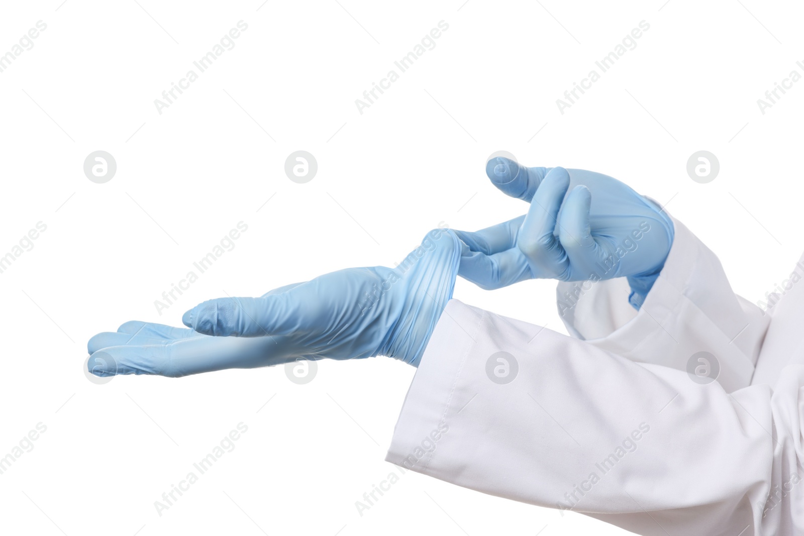 Photo of Doctor wearing light blue medical gloves on white background, closeup