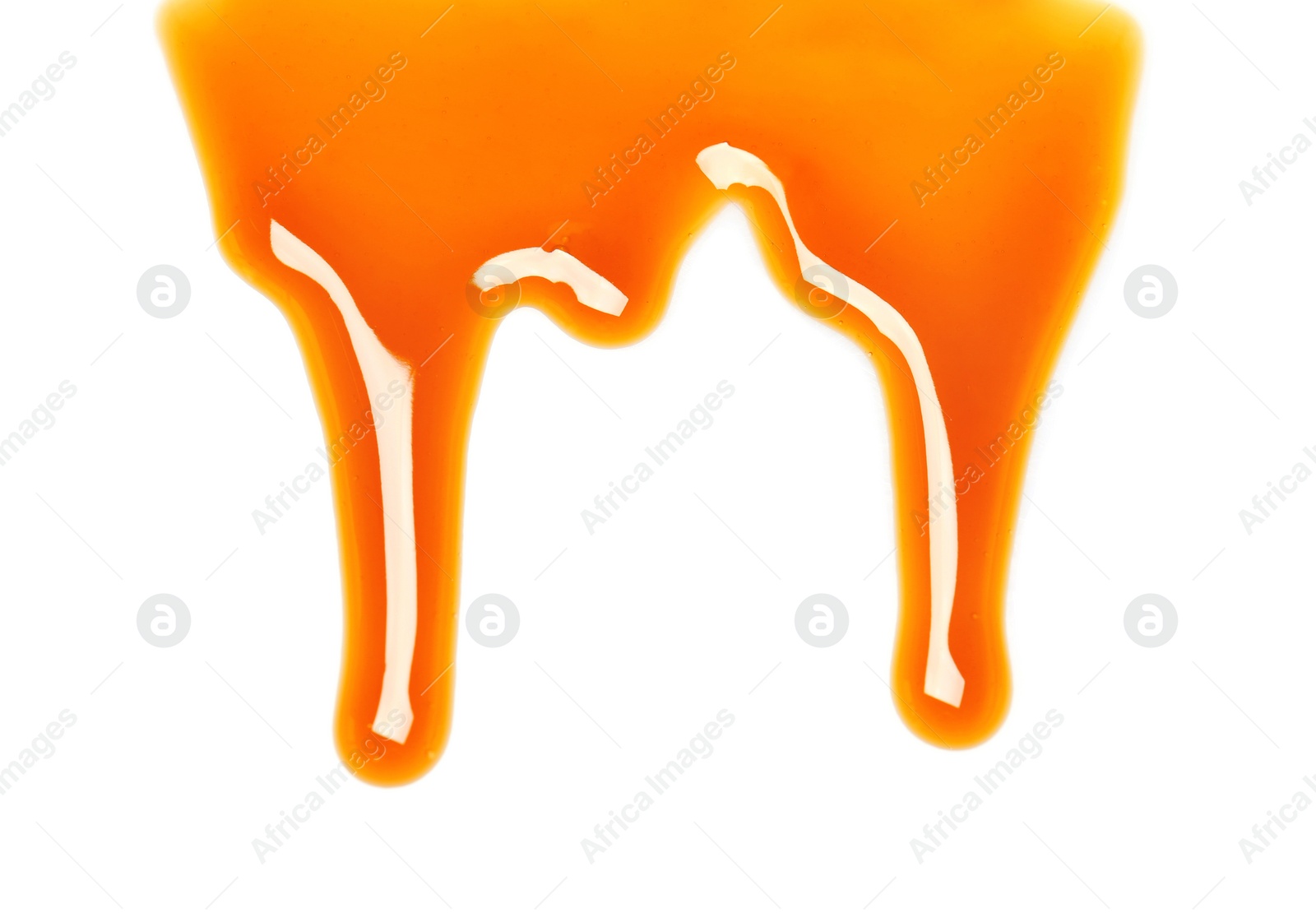 Photo of Delicious caramel sauce on white background