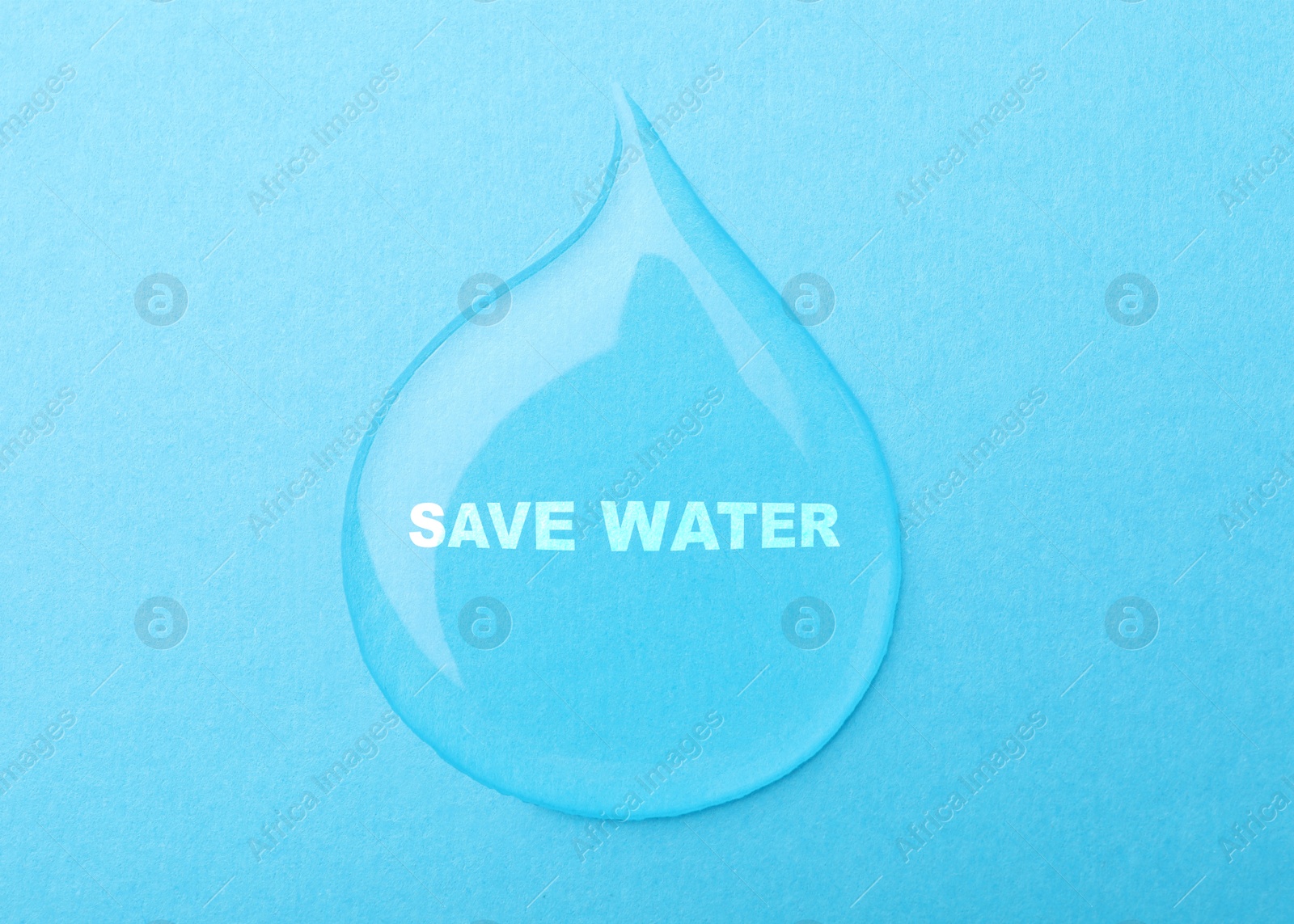 Image of Save Water concept. Drop on light blue background