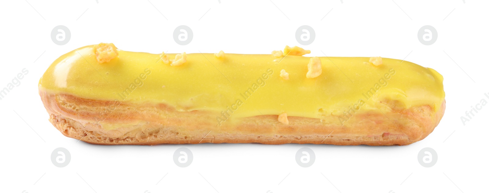 Photo of Delicious eclair covered with yellow glaze isolated on white