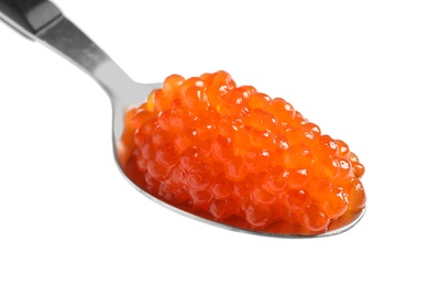 Photo of Spoon with delicious red caviar on white background