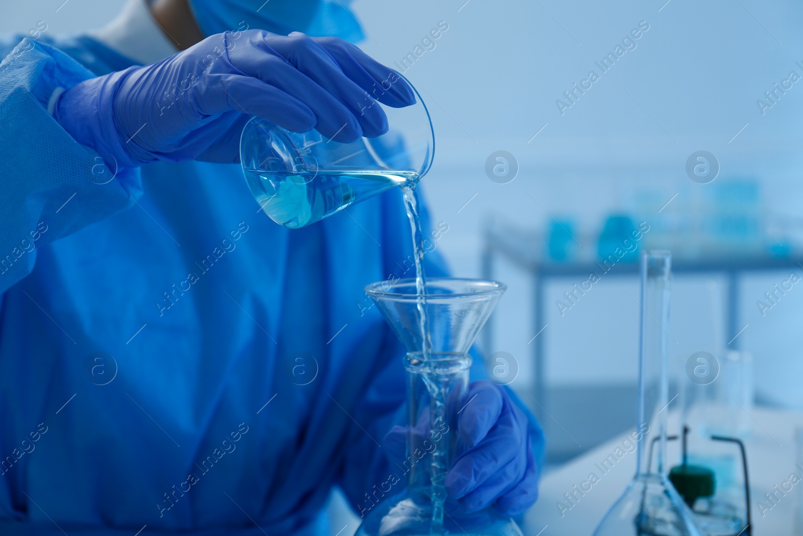 Photo of Scientist working with sample in laboratory, closeup. Medical research