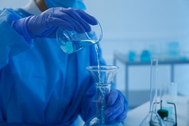 Scientist working with sample in laboratory, closeup. Medical research