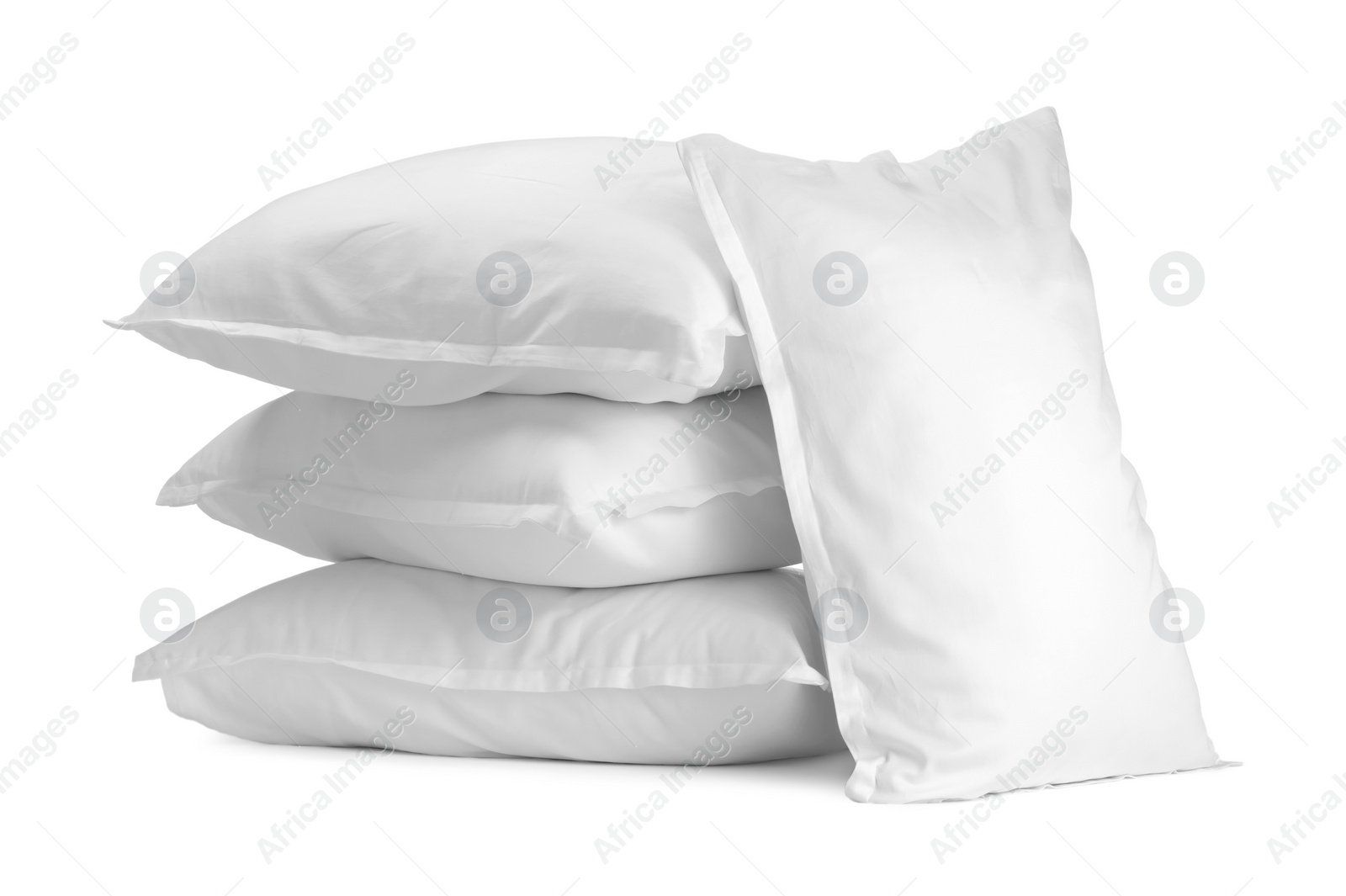 Photo of Many new soft pillows isolated on white