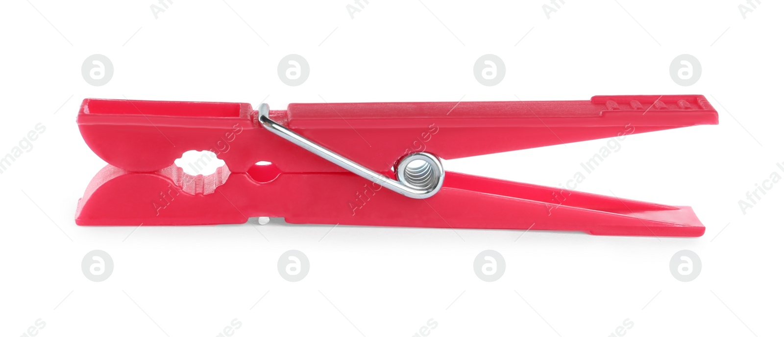 Photo of Bright pink plastic clothespin isolated on white