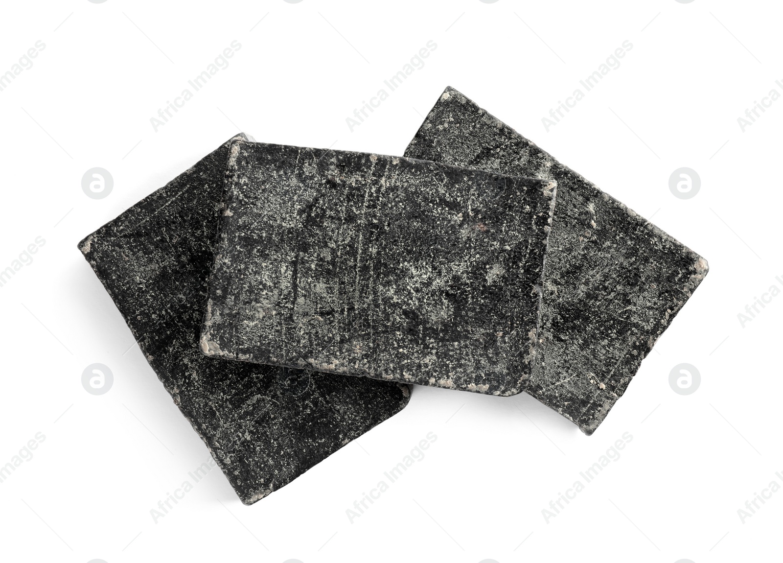 Photo of Tar soap bars isolated on white, top view. Natural product