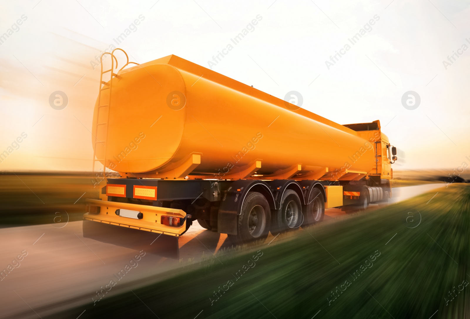 Image of Logistics concept. Truck on country road, motion blur effect 