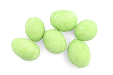 Pile of wasabi coated peanuts on white background, top view