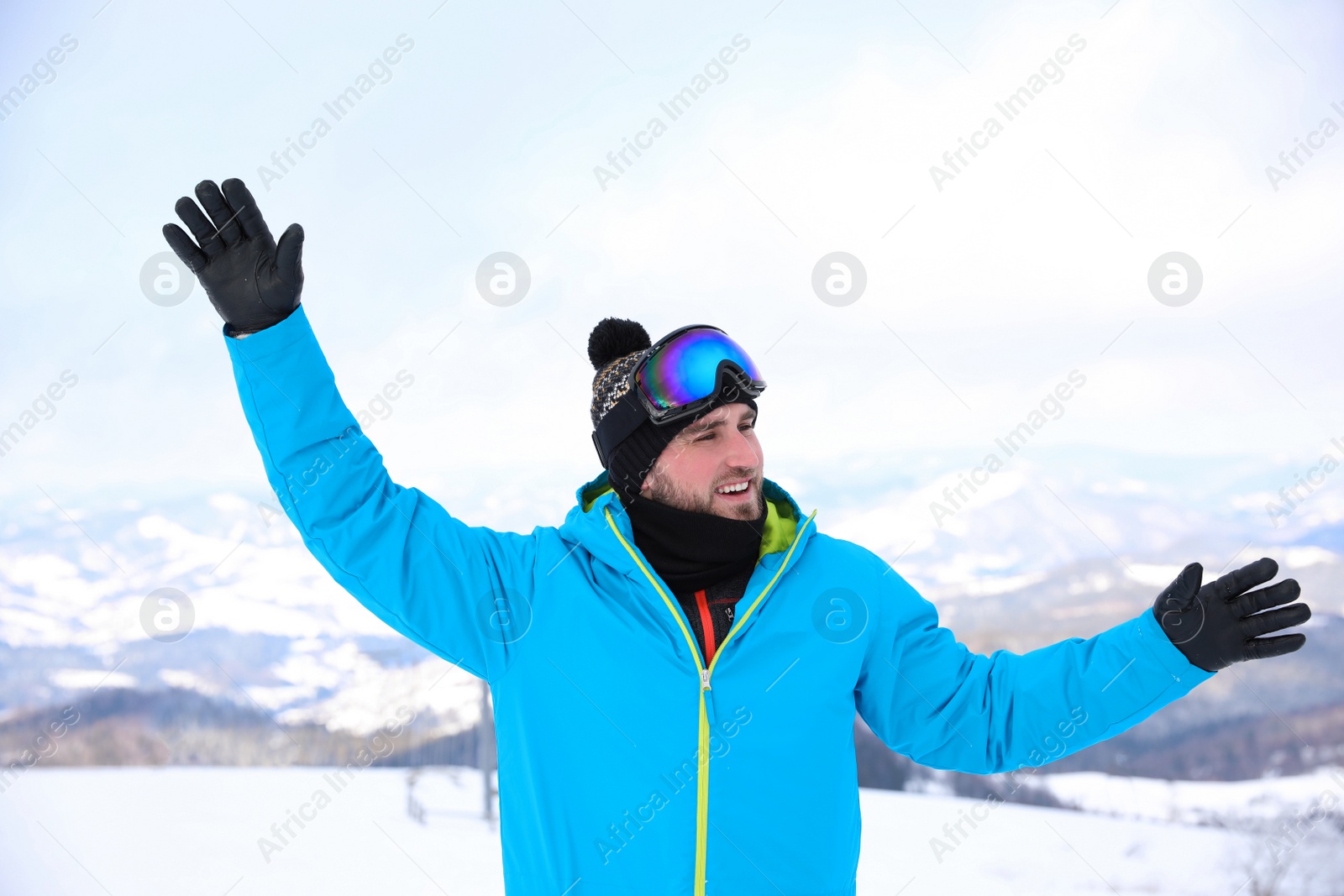 Photo of Young man at mountain resort. Winter vacation