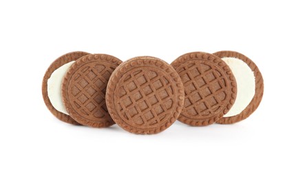 Photo of Tasty chocolate sandwich cookies with cream on white background