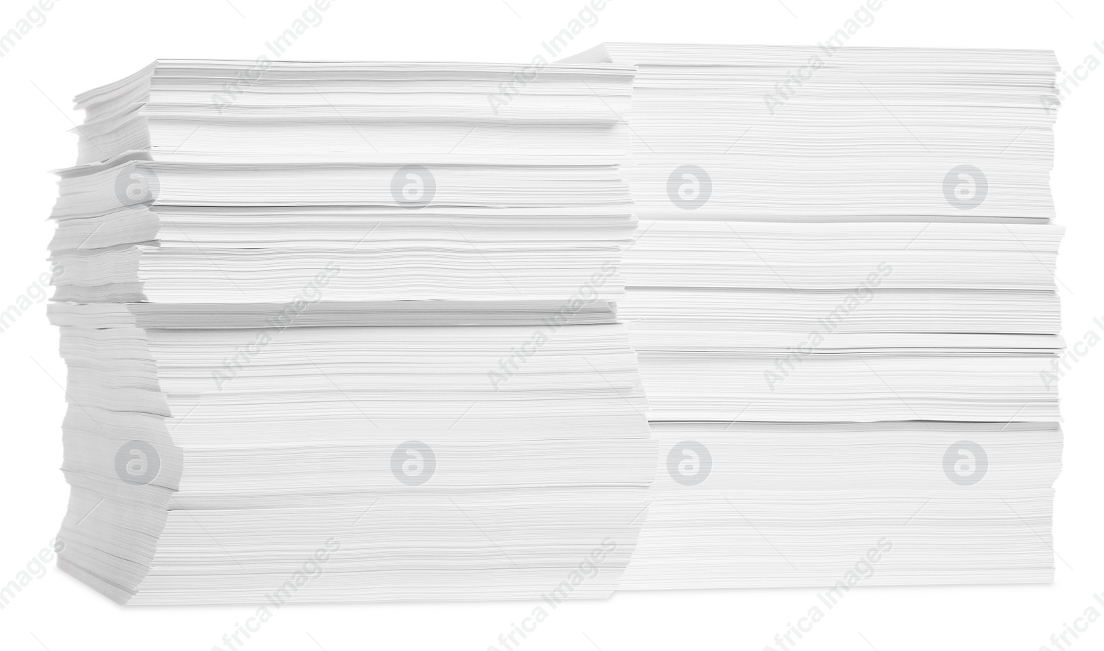 Photo of Stacks of paper sheets on white background