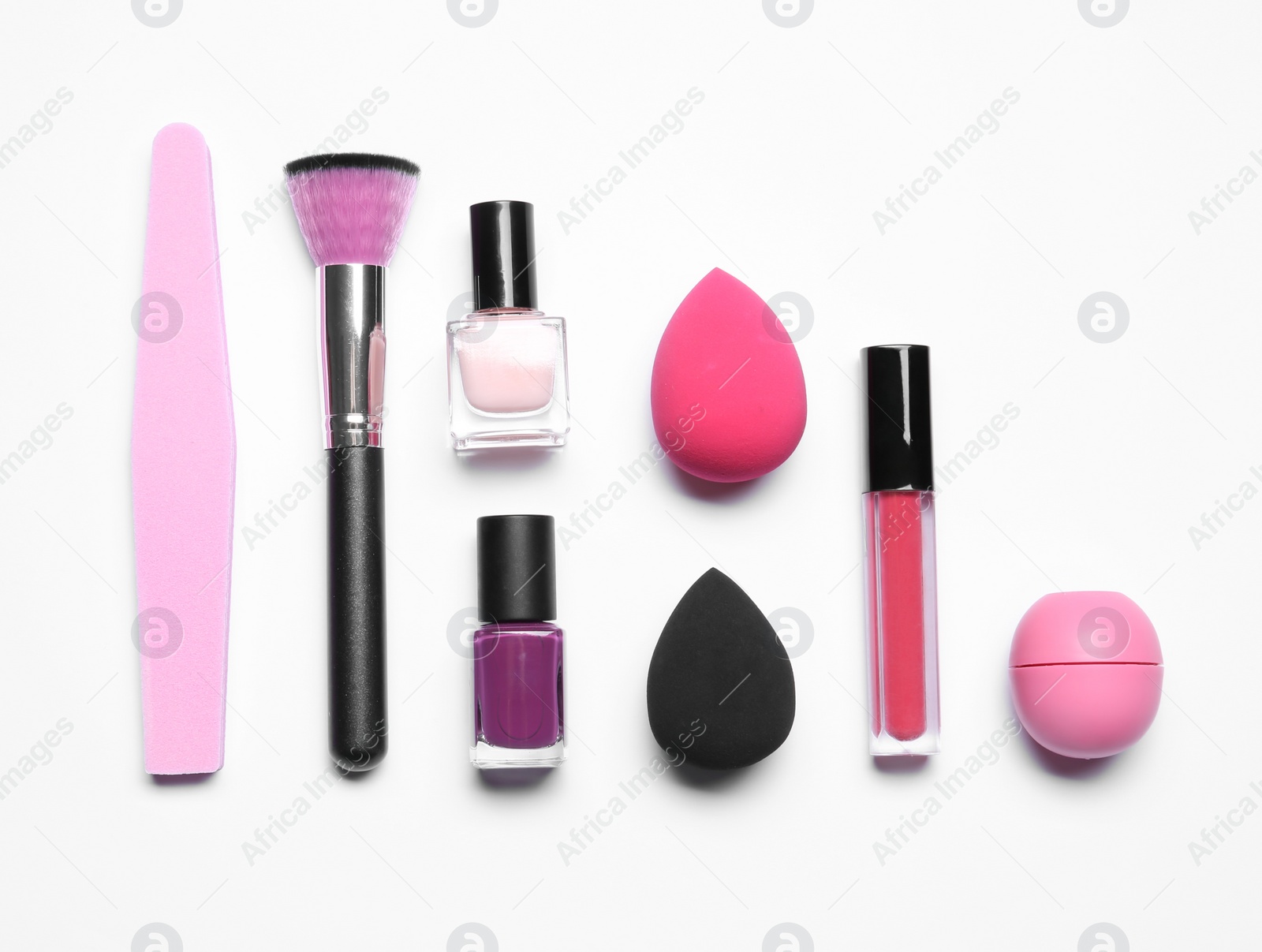 Photo of Set of makeup products on white background, top view