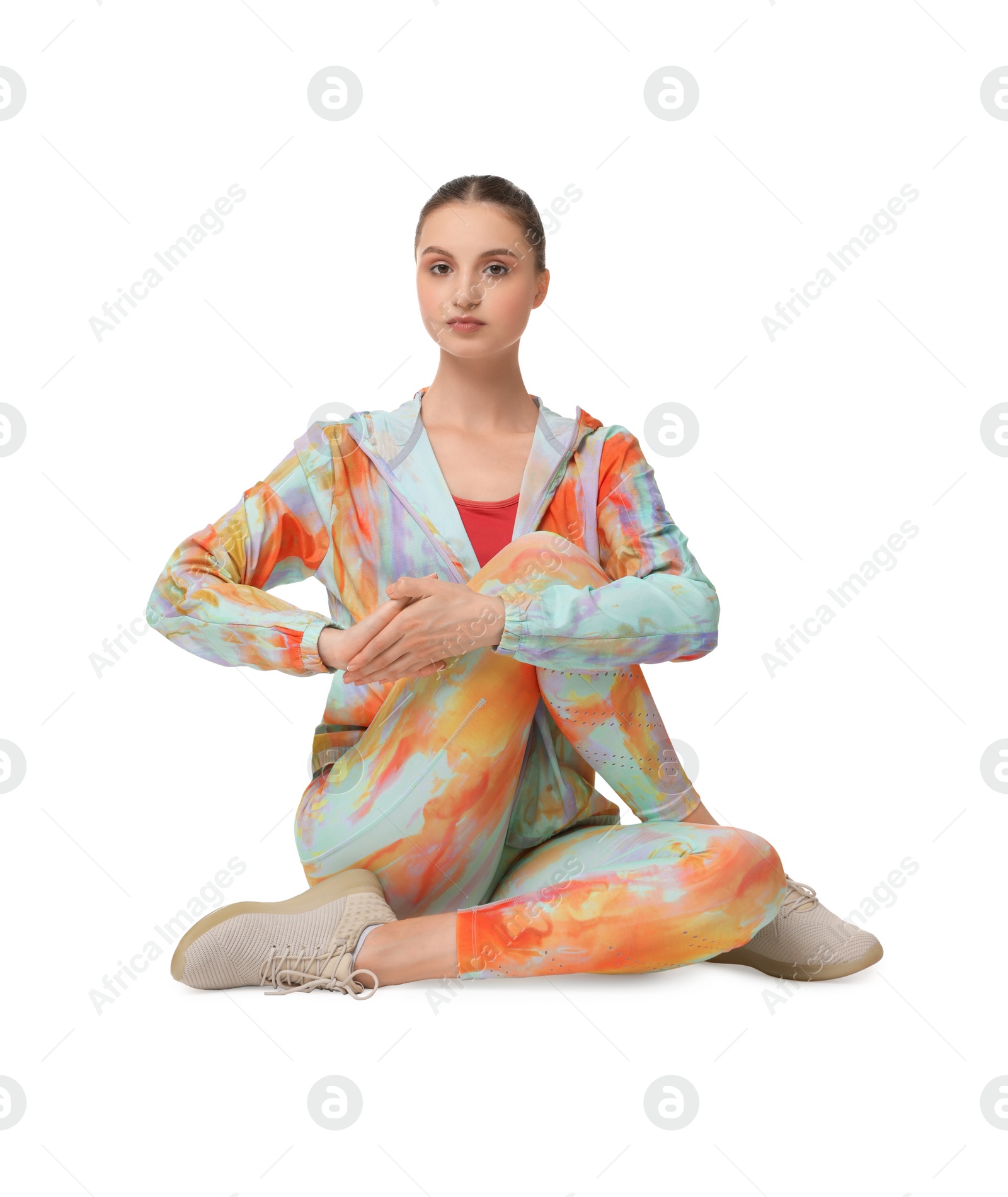 Photo of Yoga workout. Young woman stretching on white background