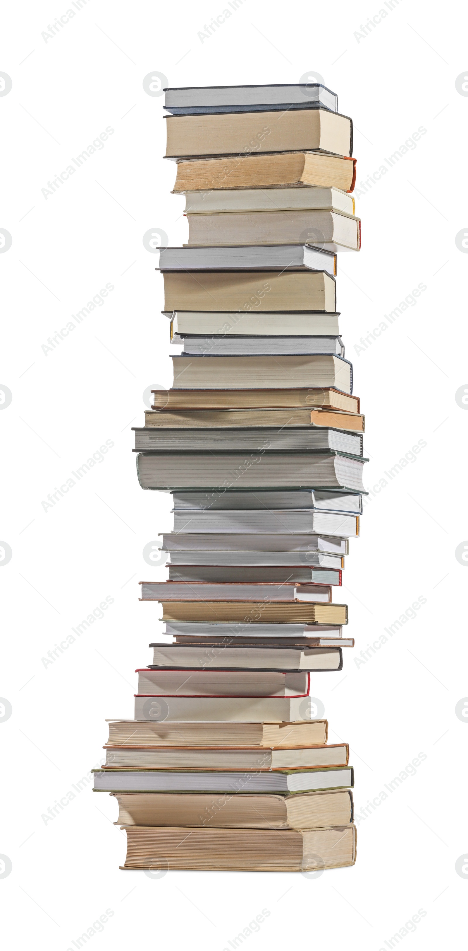 Photo of High stack of many different books isolated on white