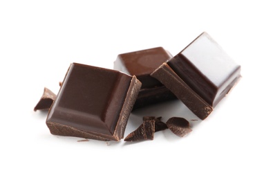 Pieces of tasty dark chocolate on white background