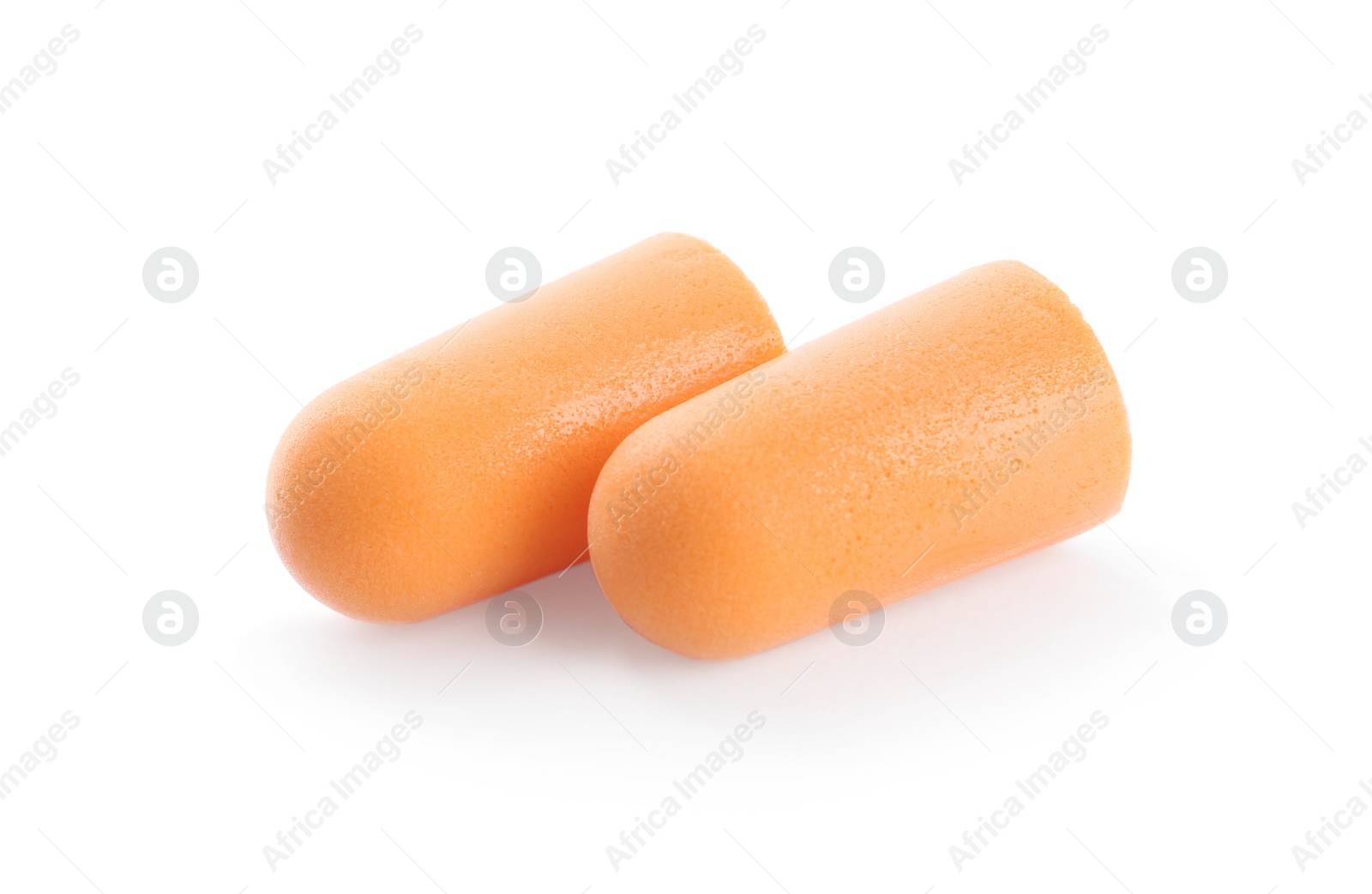 Photo of Pair of orange ear plugs isolated on white