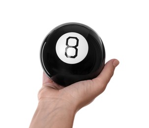 Photo of Woman holding magic eight ball on white background, closeup