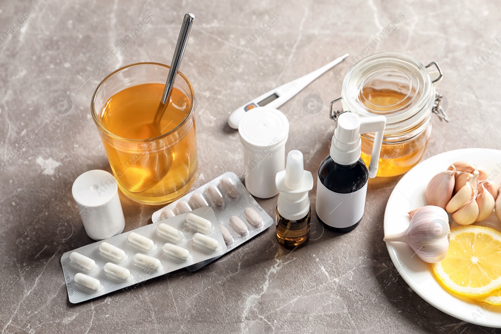 Photo of Natural and medical cold remedies on table