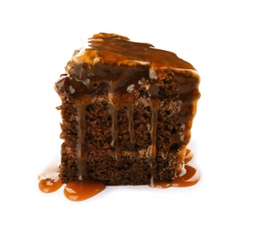 Piece of delicious homemade cake with caramel sauce white background