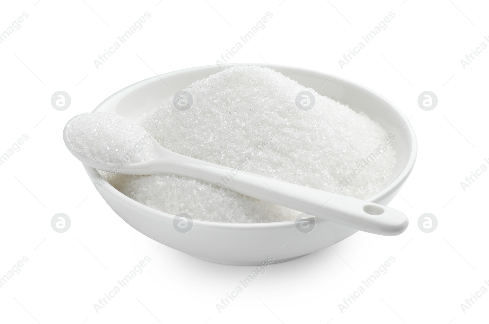 Photo of Granulated sugar in bowl and spoon isolated on white