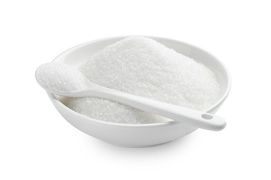 Photo of Granulated sugar in bowl and spoon isolated on white