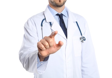 Male doctor pointing on white background, closeup