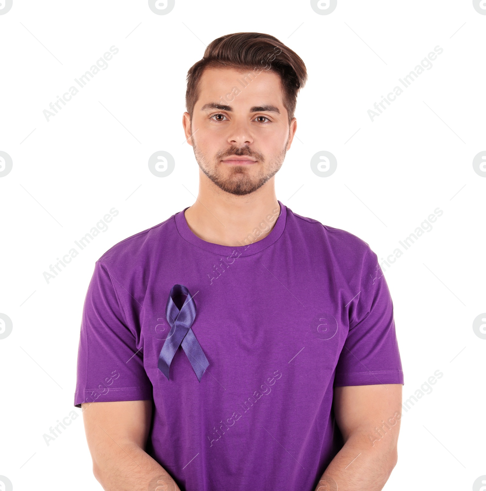 Photo of Young man with blue ribbon on white background. Urological cancer awareness