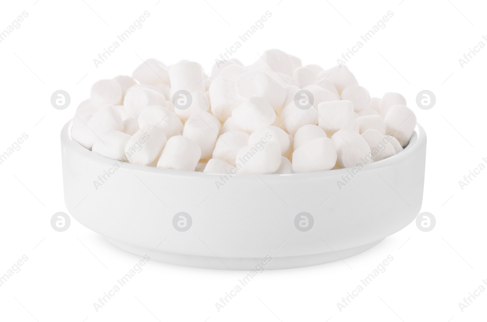 Photo of Bowl of delicious puffy marshmallows isolated on white