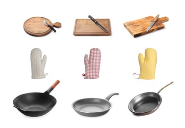 Image of Set with pans, knives with boards and gloves for hot dishes on white background