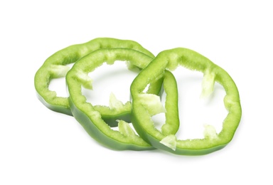 Photo of Slices of green bell pepper on white background
