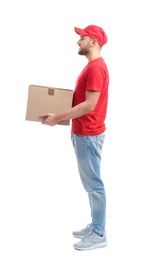 Photo of Full length portrait of man in uniform carrying carton box on white background. Posture concept