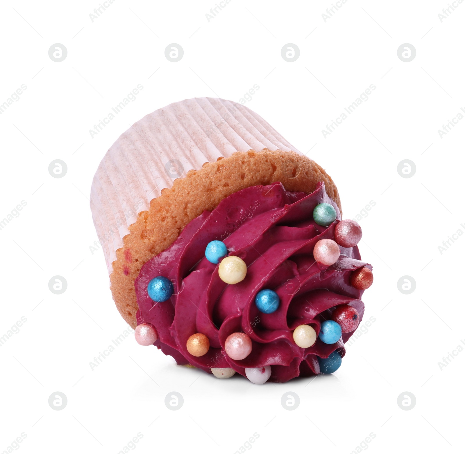 Photo of Dropped cupcake with cream on white background. Troubles happen