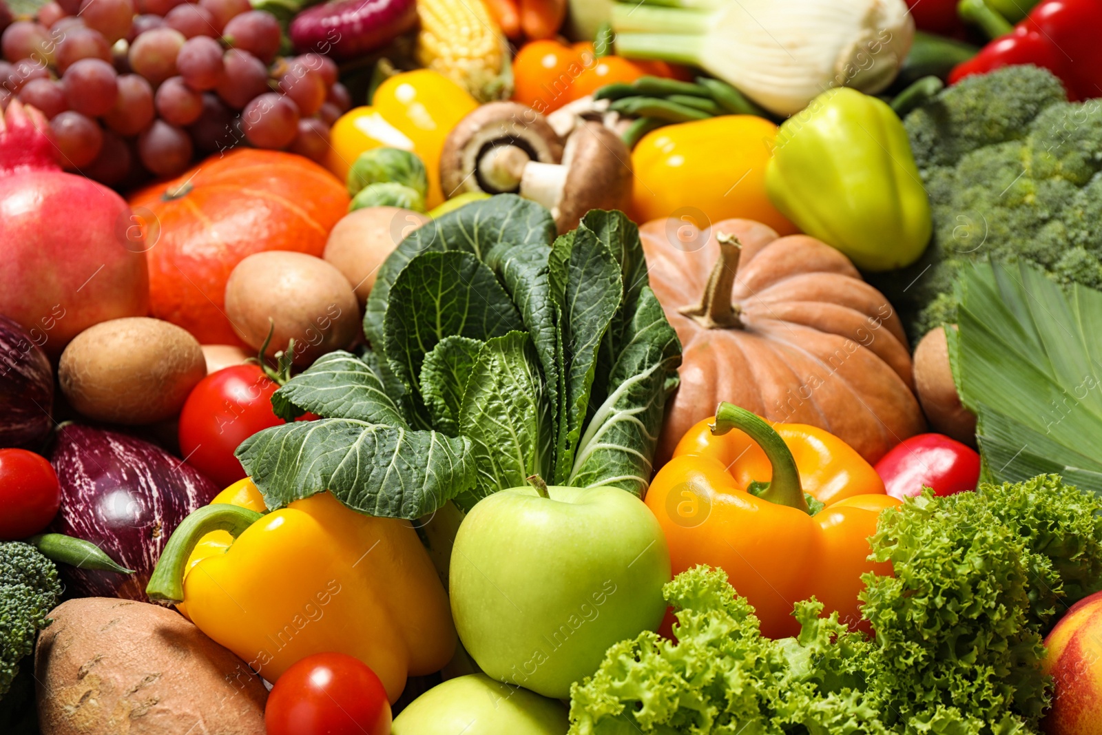 Photo of Assortment of organic fresh fruits and vegetables as background, closeup