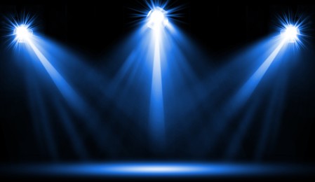 Bright spotlights in darkness. Professional stage equipment