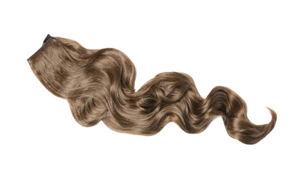 Lock of brown wavy hair on white background, top view