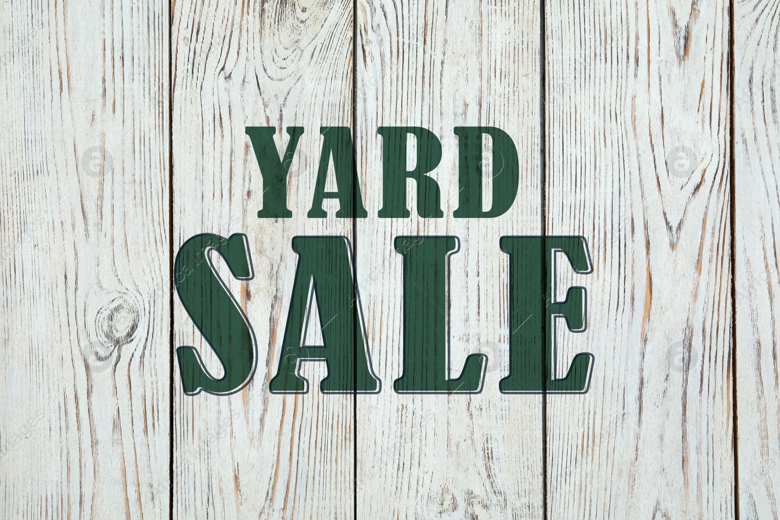 Image of Words Yard Sale on white wooden surface, top view