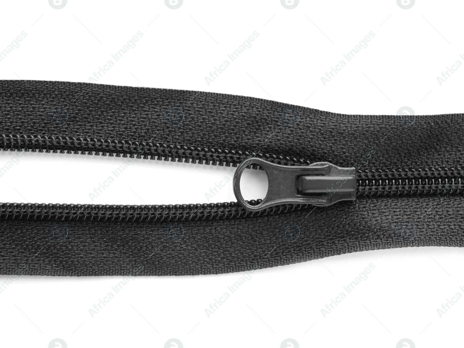 Photo of Black zipper on white background, top view