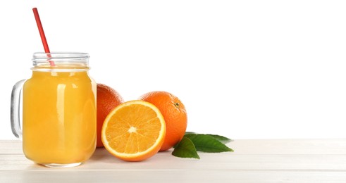 Photo of Delicious orange juice and fresh fruits on wooden table against white background. Space for text