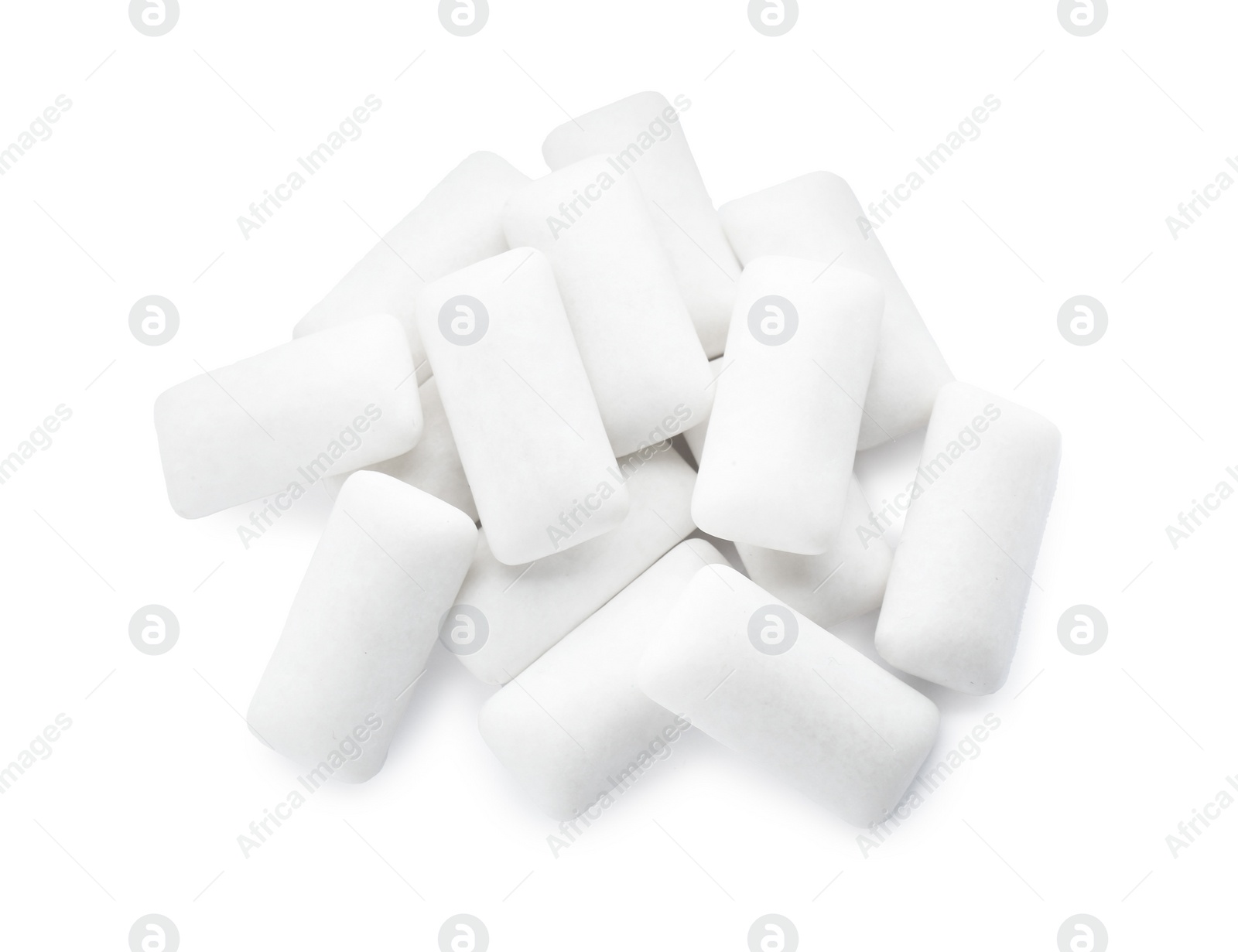 Photo of Heap of chewing gum pieces on white background, top view