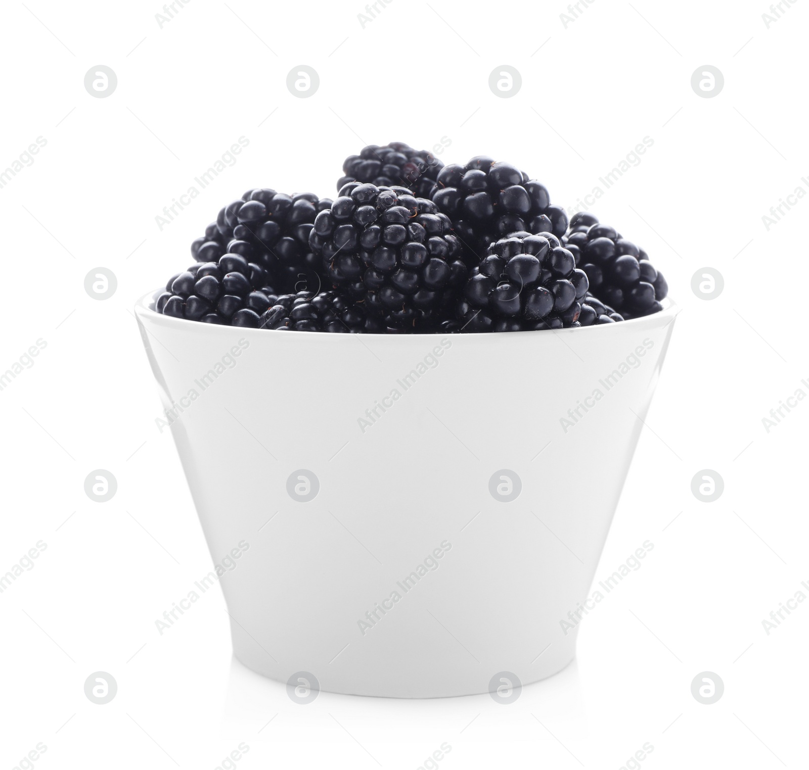 Photo of Bowl with ripe blackberries on white background